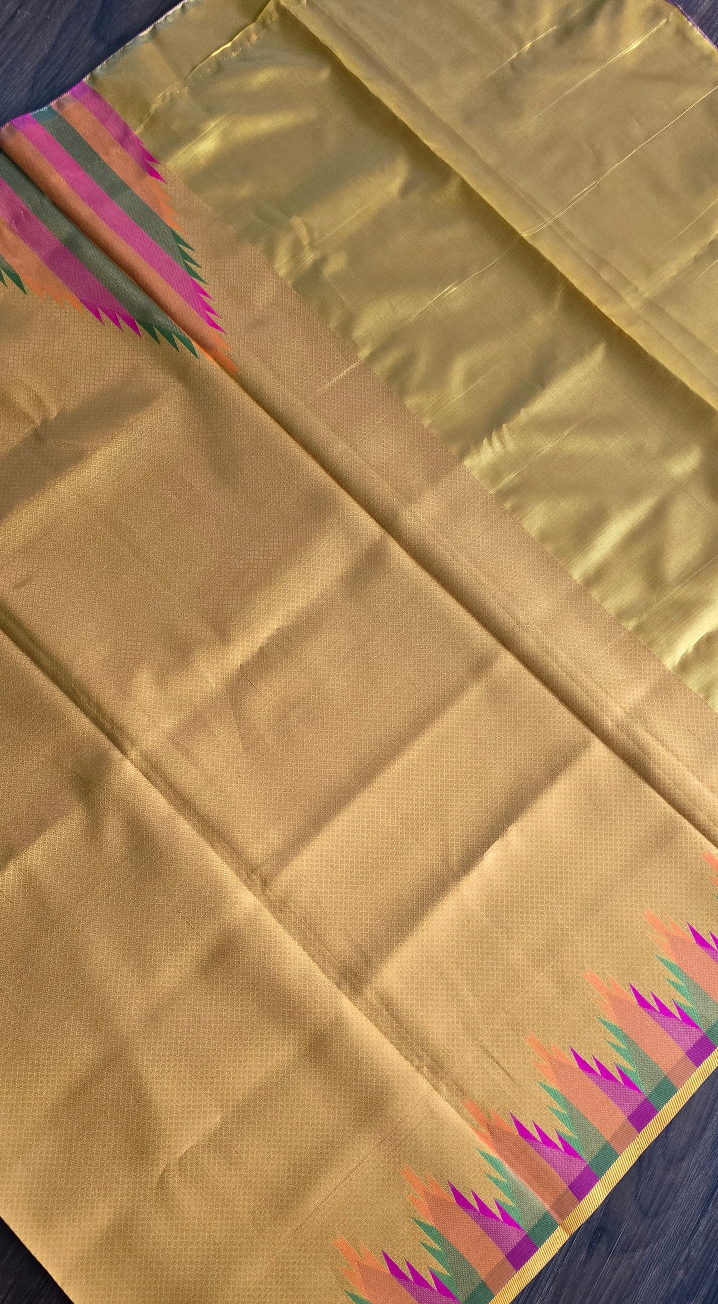 Golden yellow temple border semi silk saree with majenta Jacquard stitched blouse. Code - SAR101