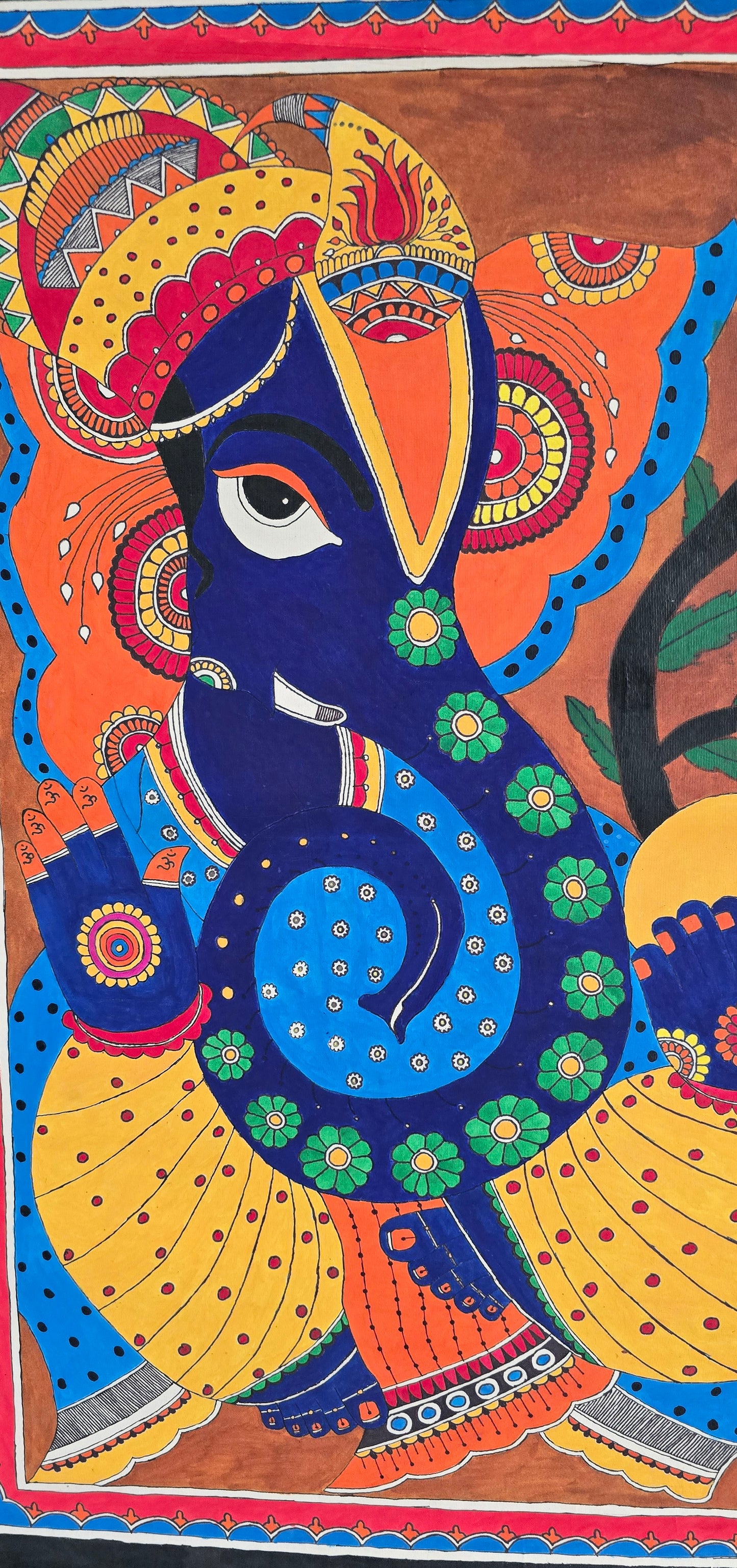 Madhubani or Mithila Painting – Lord Ganesha with his beautiful ornaments and Laddu in hand.