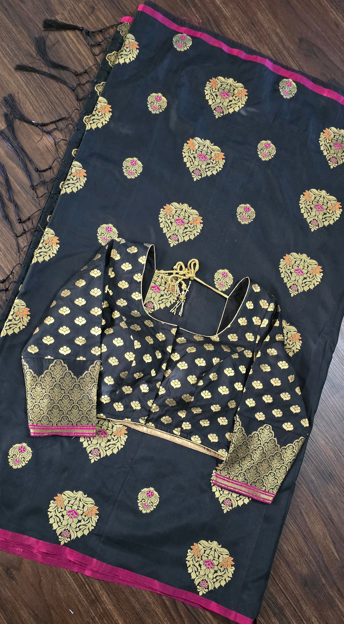 Black Art Silk soft saree in zari weave border and butas with stitched Blouse.