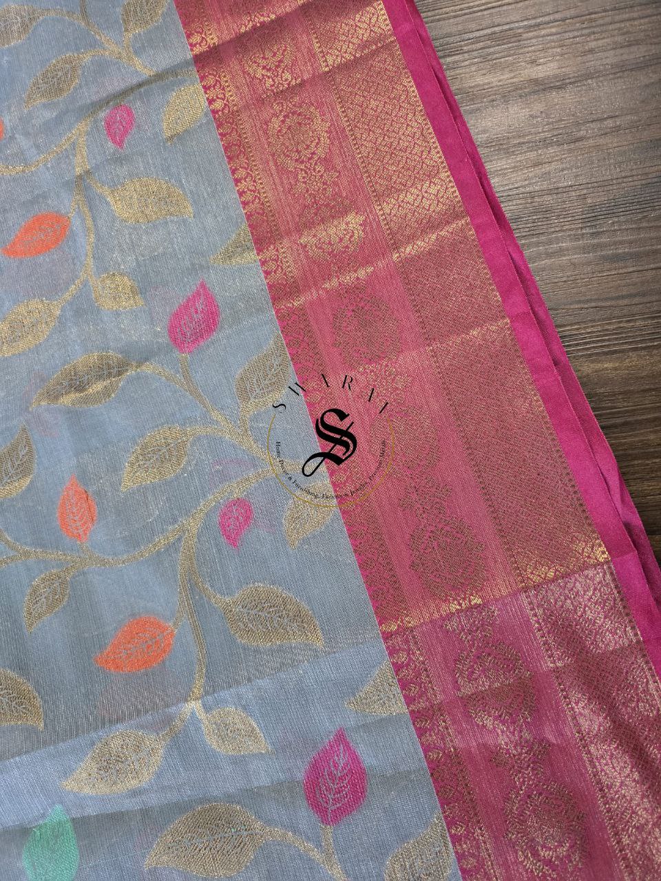 Tissue Silk saree with Zari weave leaf pattern with contrast Brocade blouse piece.