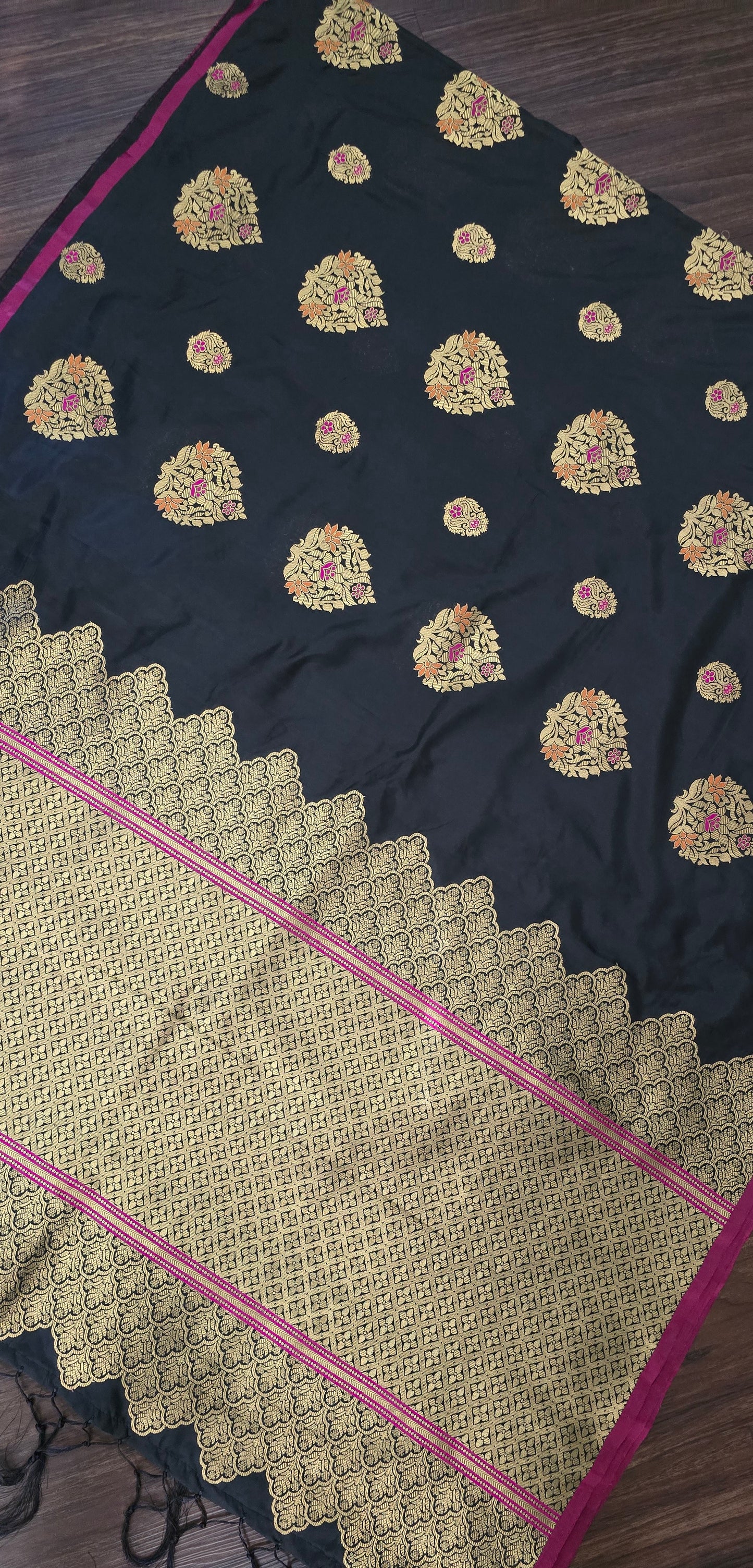 Black Art Silk soft saree in zari weave border and butas with stitched Blouse.