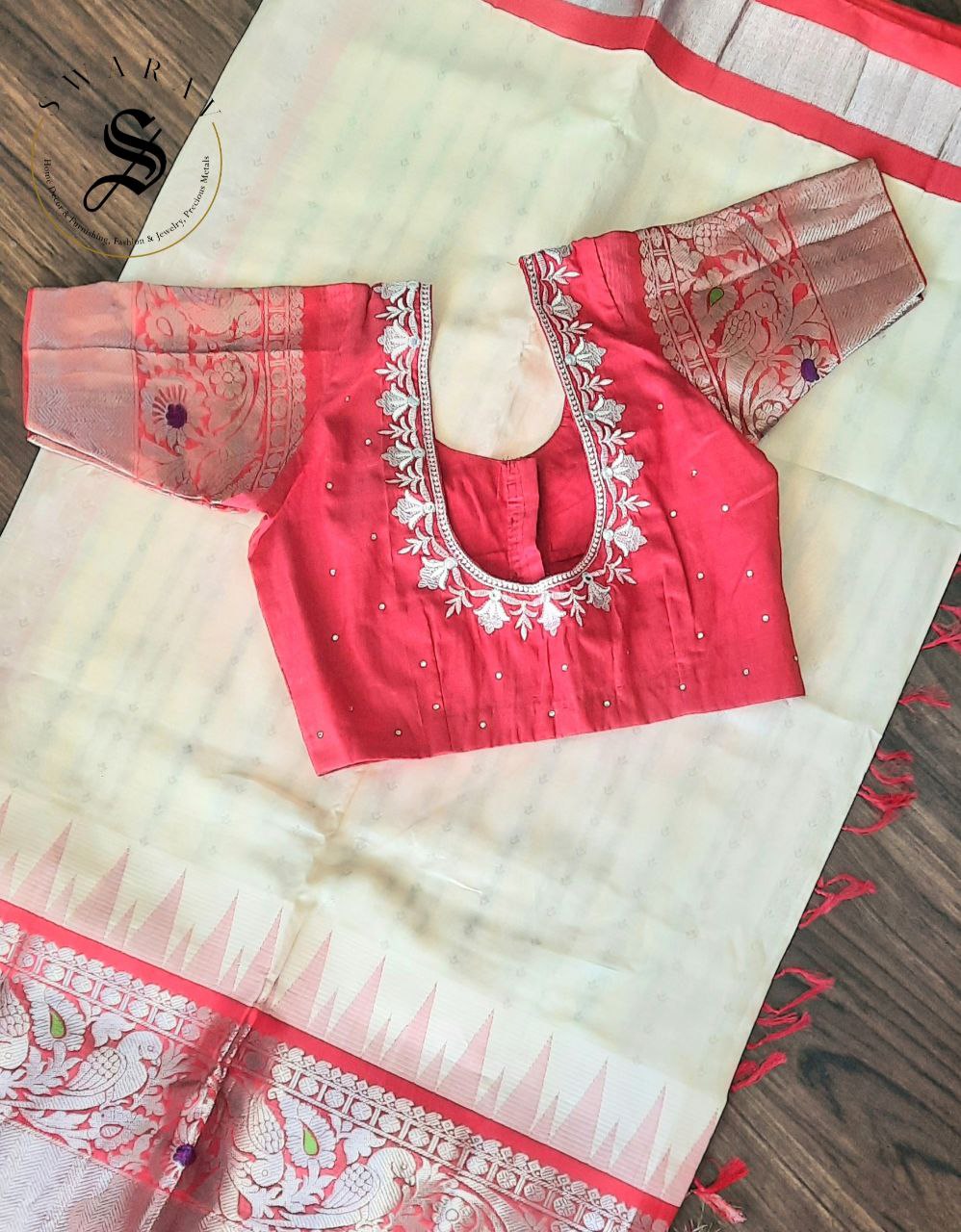 Kuppadam pattu Saree with stitched contrast work blouse.