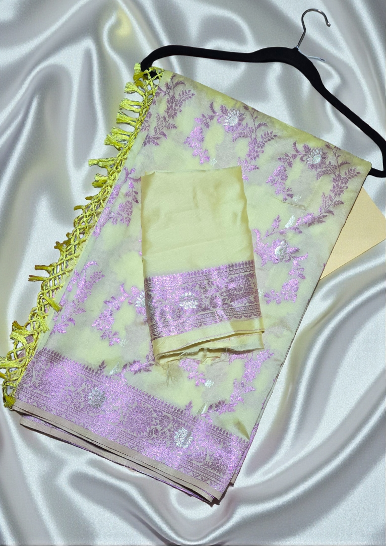 Soft Organza silk with zari woven Banarasi Jaal pattern with matching blouse piece.