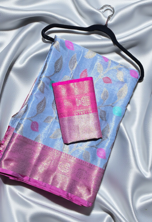 Tissue Silk saree with Zari weave leaf pattern with contrast Brocade blouse piece.