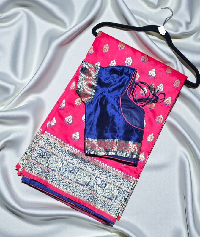 Art Silk soft saree in zari weave border and butas with stitched Blouse.