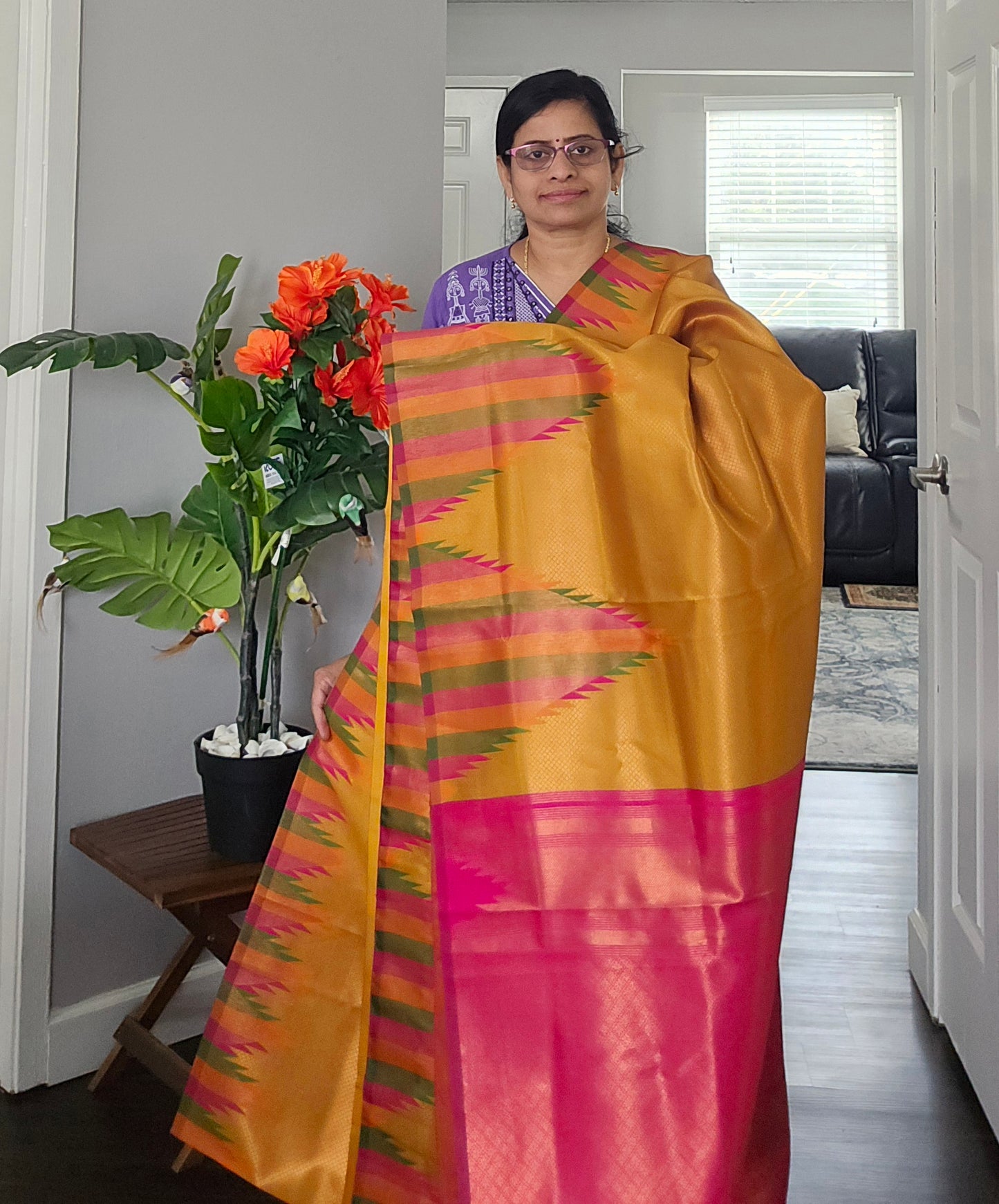 Golden yellow temple border semi silk saree with majenta Jacquard stitched blouse. Code - SAR101