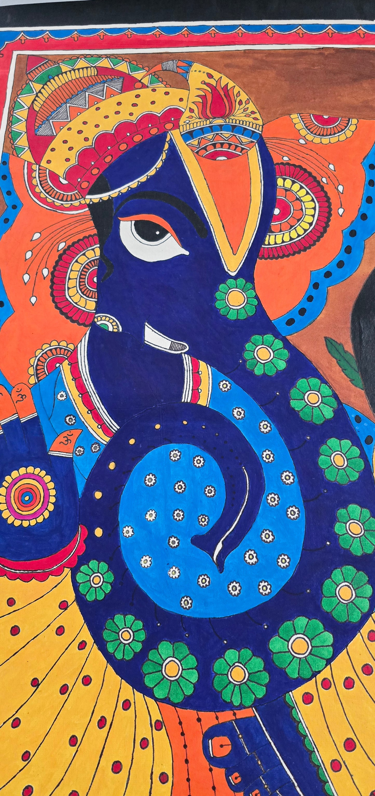 Madhubani or Mithila Painting – Lord Ganesha with his beautiful ornaments and Laddu in hand.