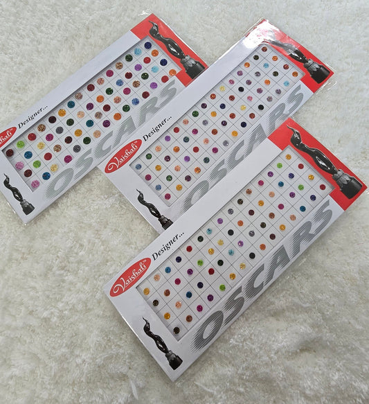 Oscar - Pack of 3 multi color glitter disco bindi. Assorted sizes. Each $4.6