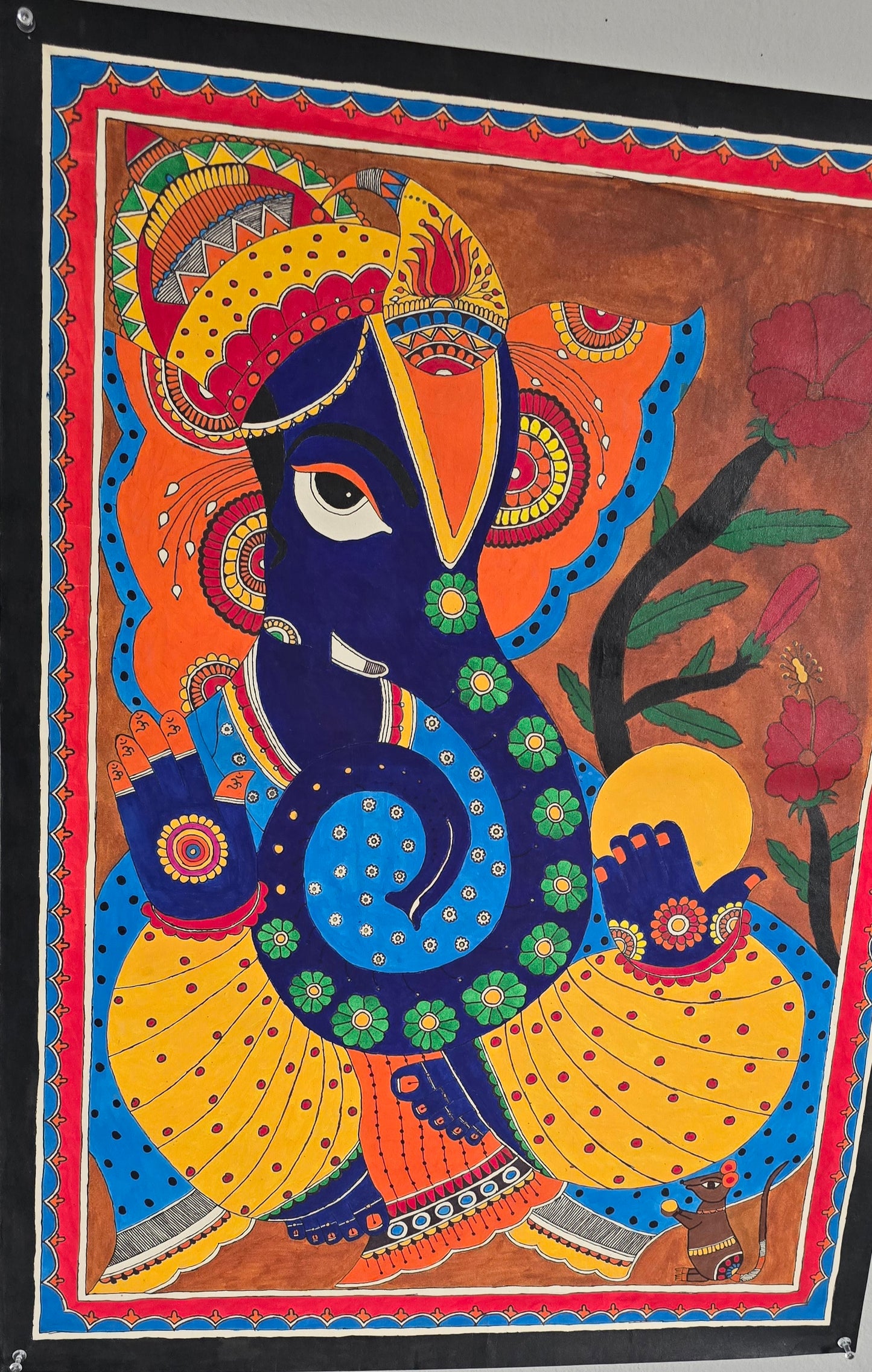 Madhubani or Mithila Painting – Lord Ganesha with his beautiful ornaments and Laddu in hand.