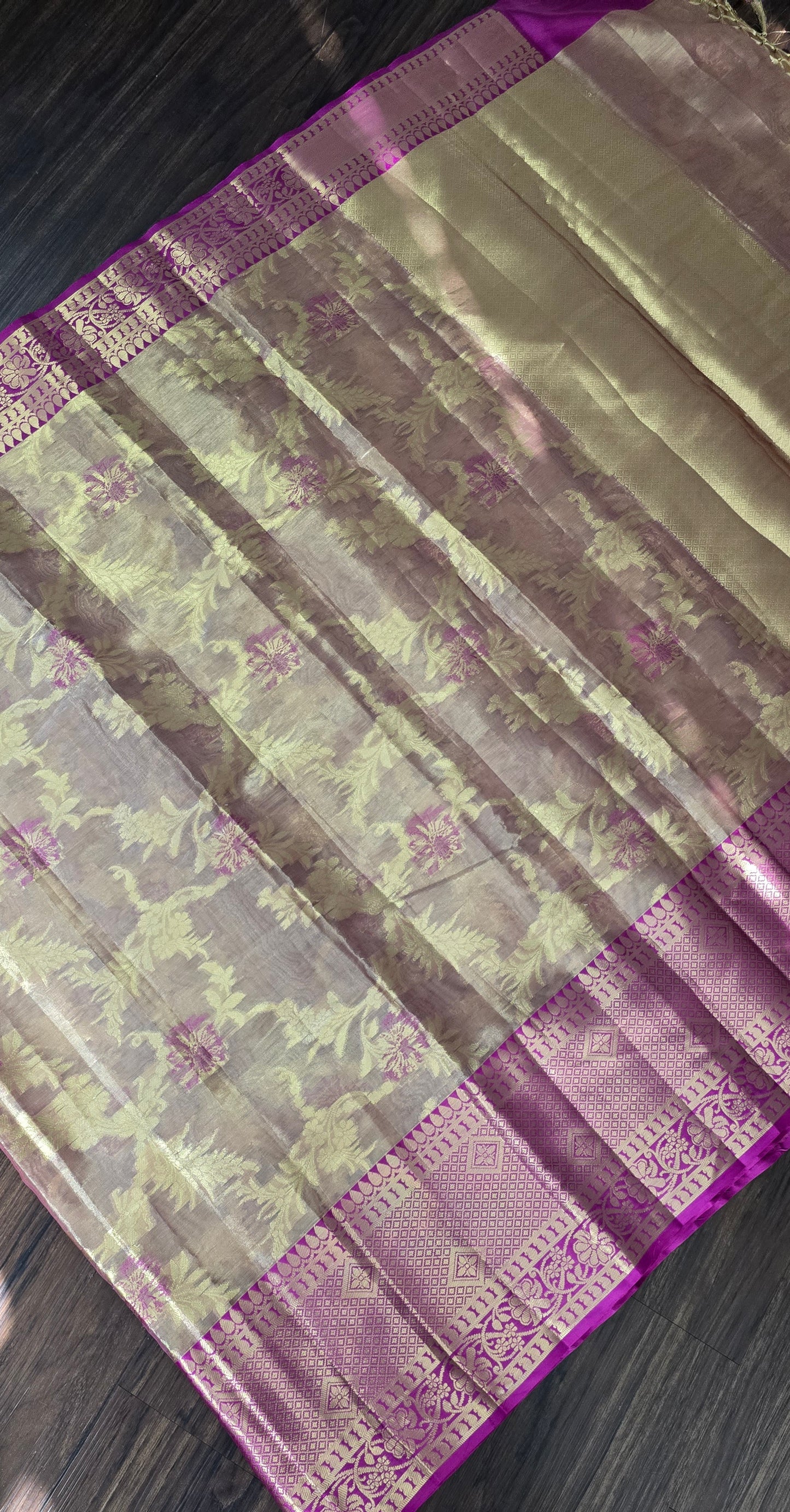 Semi soft Tissue Silk Saree with zari weave floral buta all over with contrast kanchi broad border.