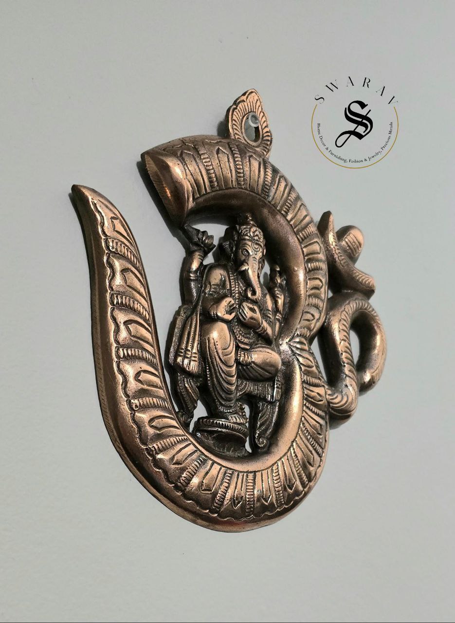 Gun metal ( Black metal/ Red Brass) Om Ganesha wall décor. Size - 9 inch.