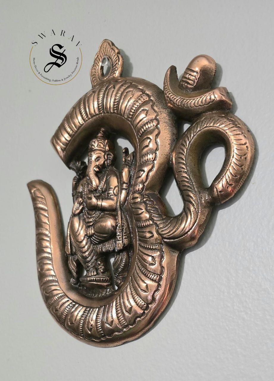 Gun metal ( Black metal/ Red Brass) Om Ganesha wall décor. Size - 9 inch.