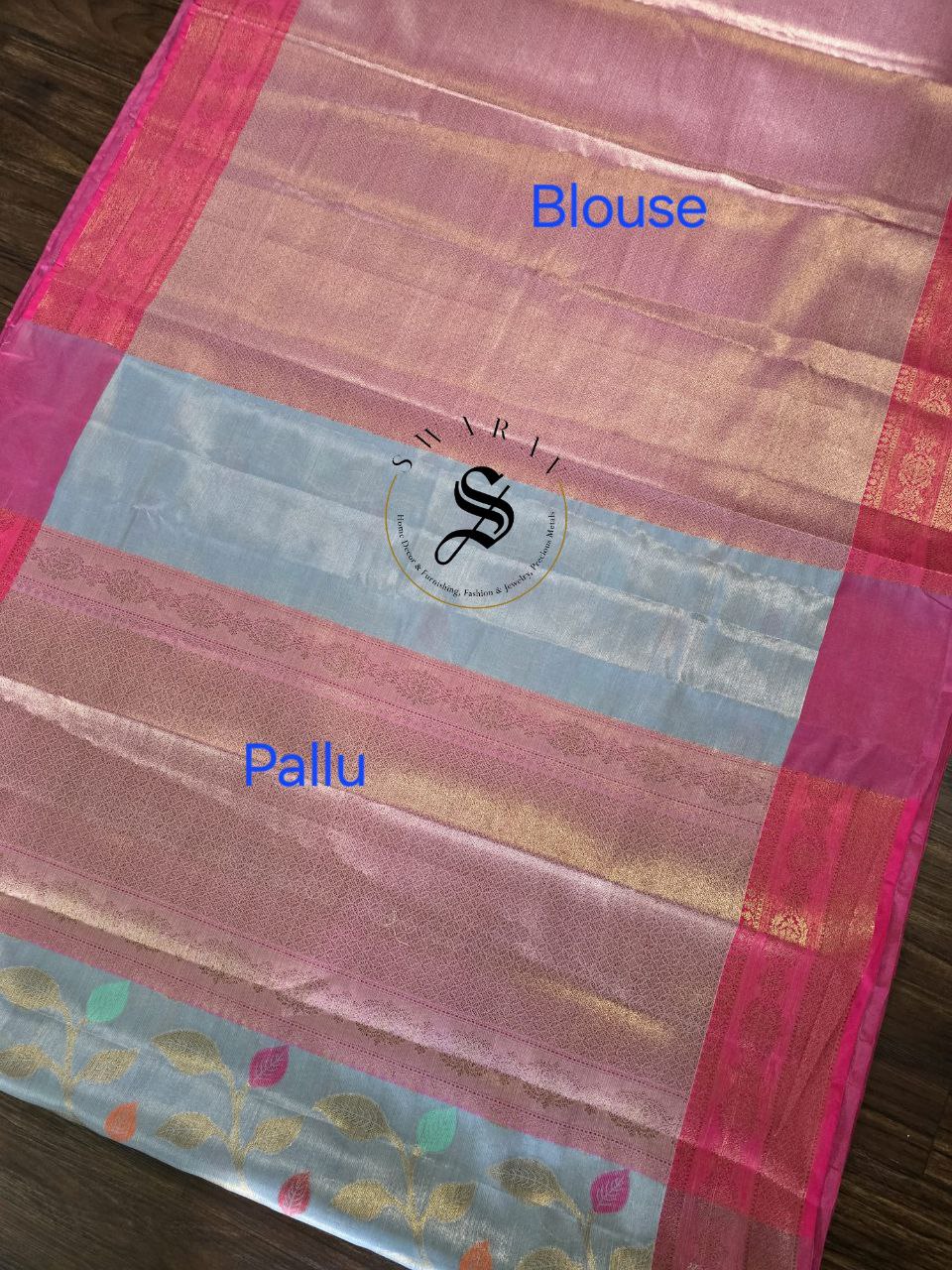 Tissue Silk saree with Zari weave leaf pattern with contrast Brocade blouse piece.
