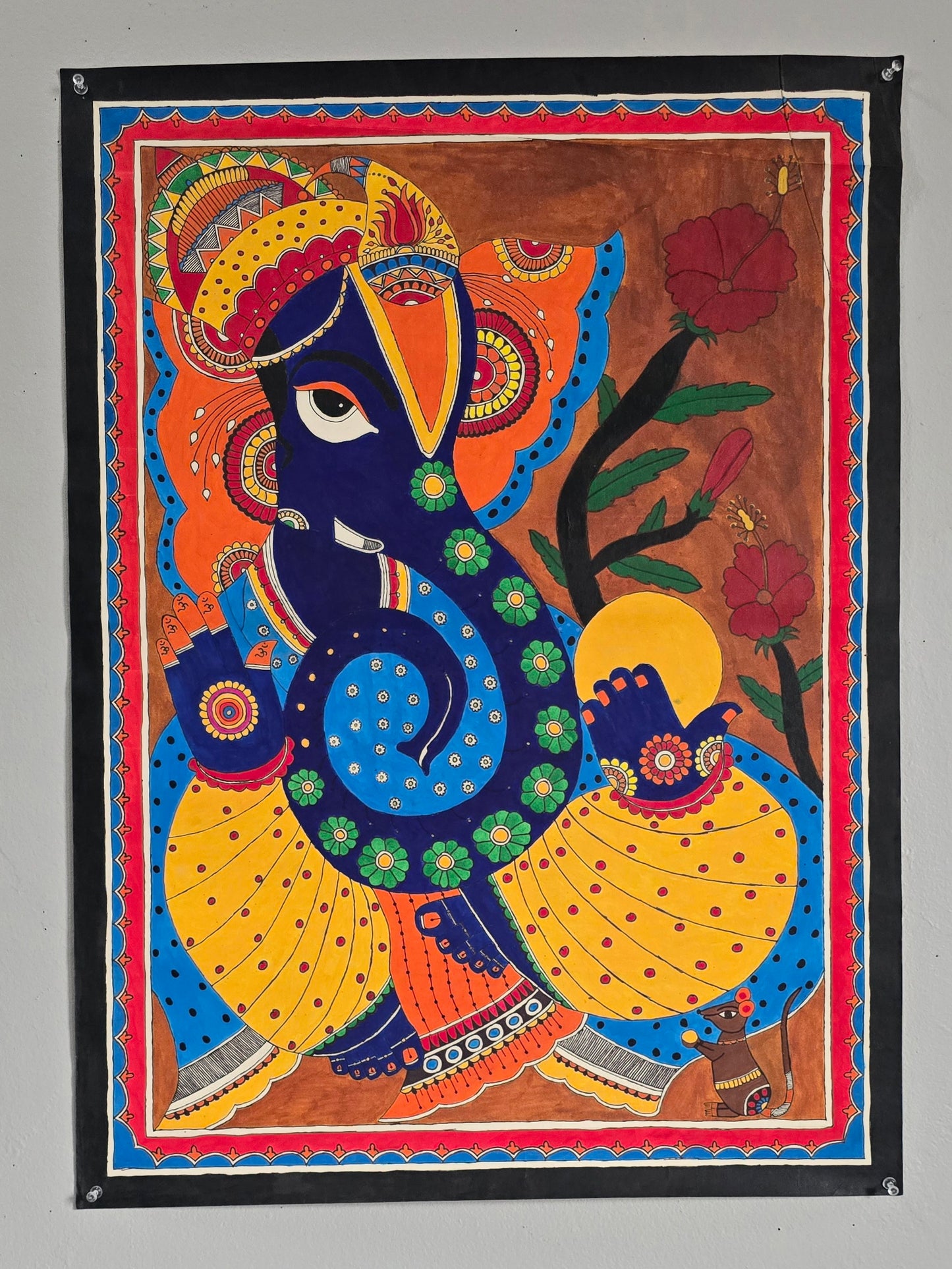 Madhubani or Mithila Painting – Lord Ganesha with his beautiful ornaments and Laddu in hand.