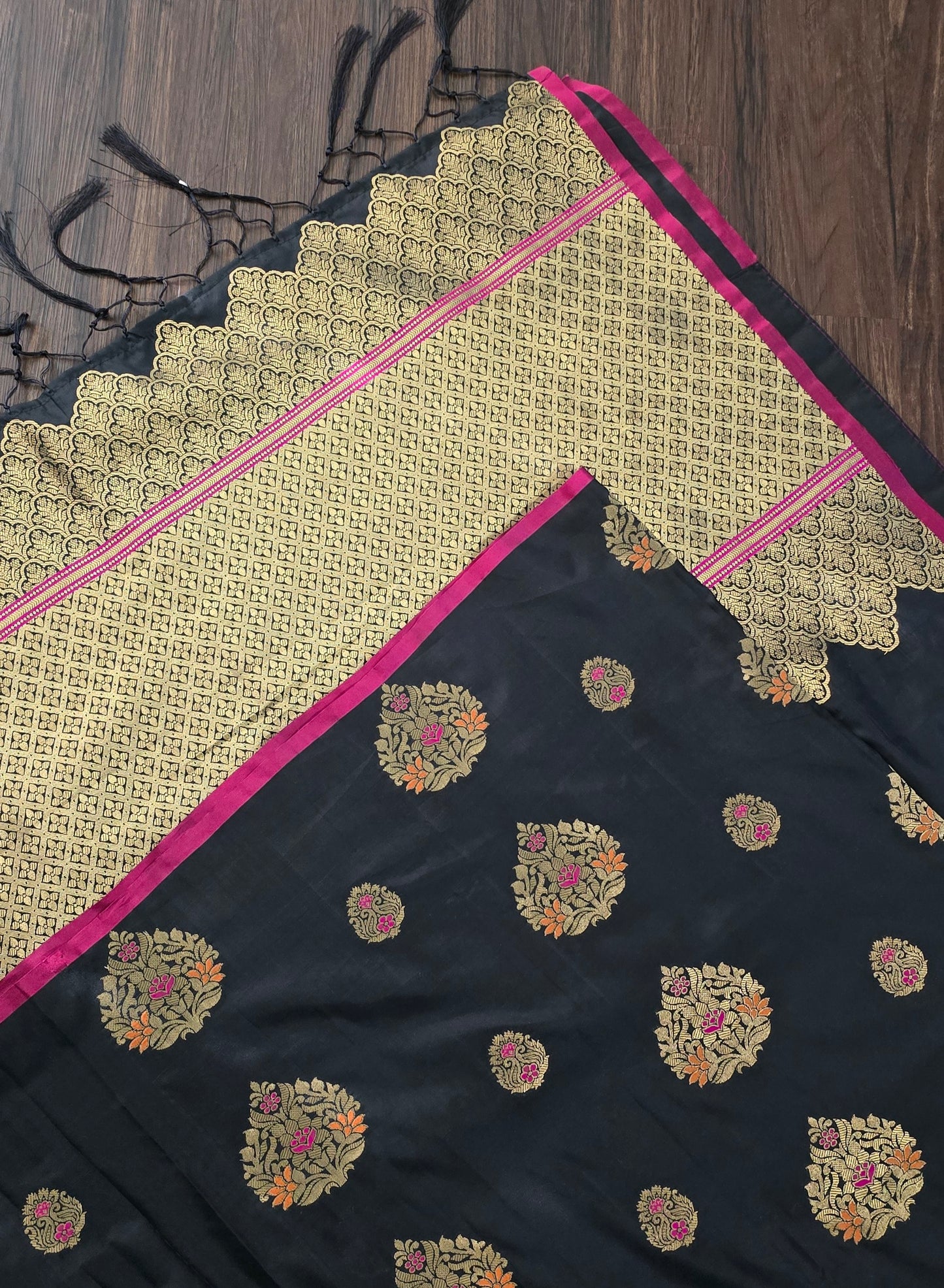 Black Art Silk soft saree in zari weave border and butas with stitched Blouse.