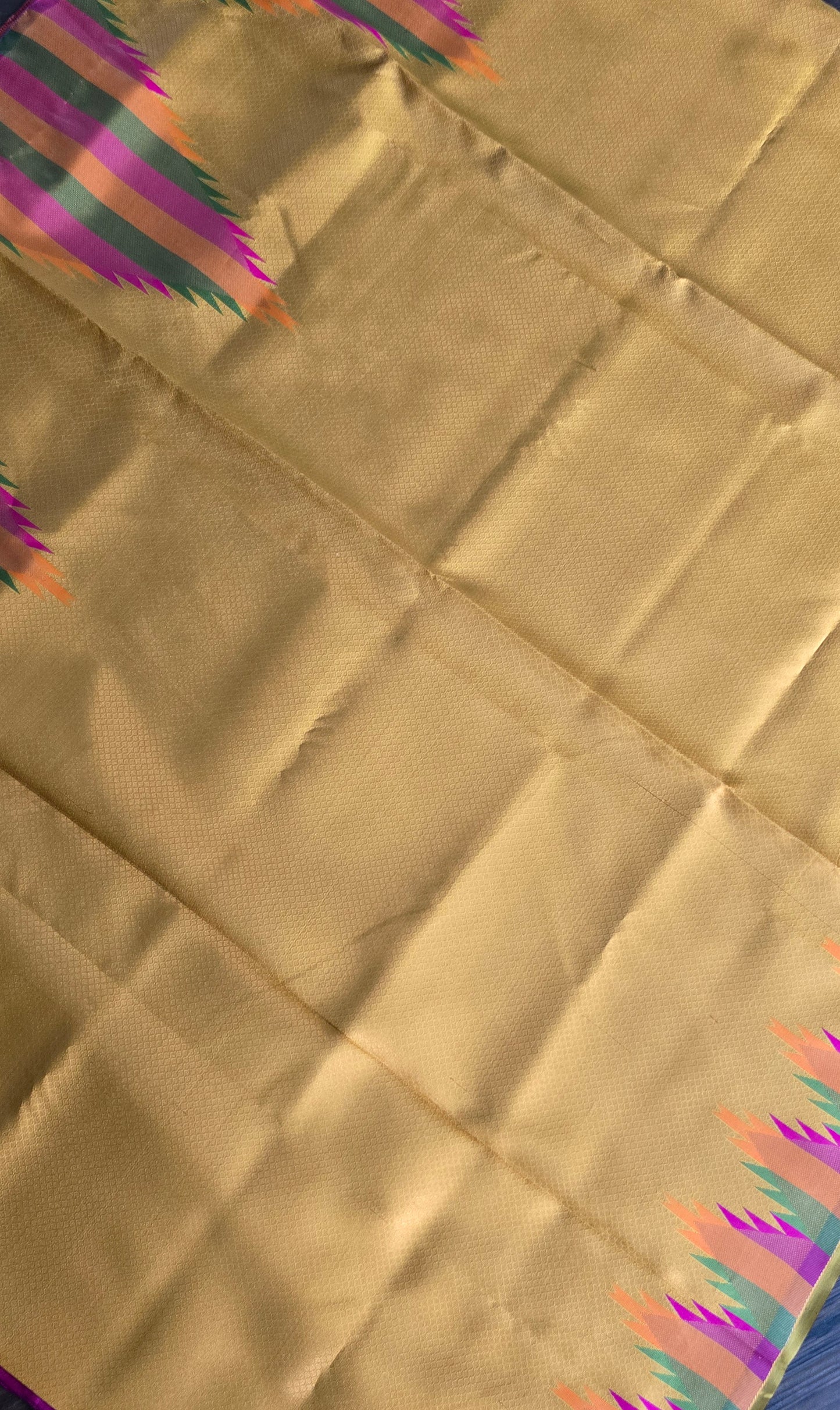 Golden yellow temple border semi silk saree with majenta Jacquard stitched blouse. Code - SAR101