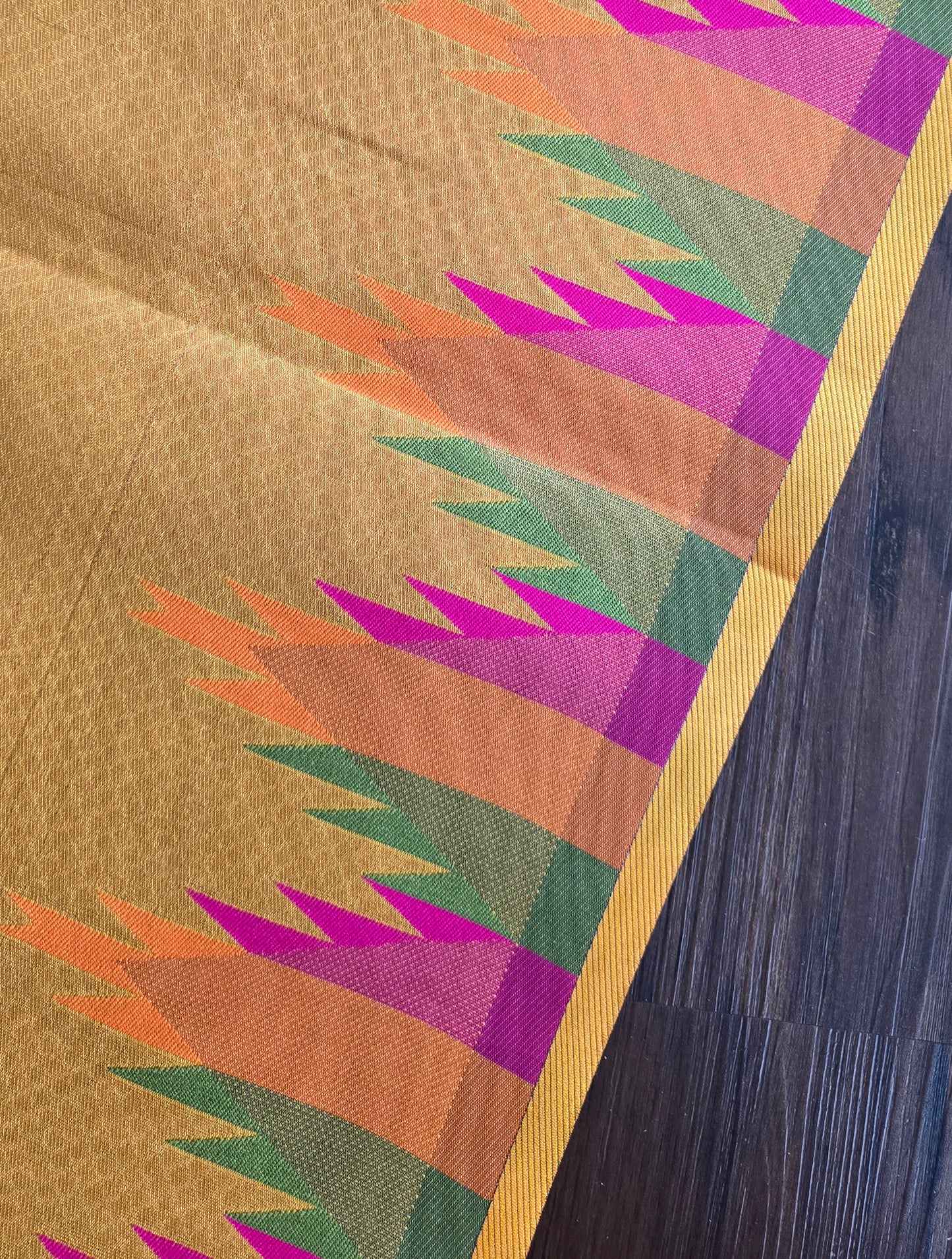 Golden yellow temple border semi silk saree with majenta Jacquard stitched blouse. Code - SAR101