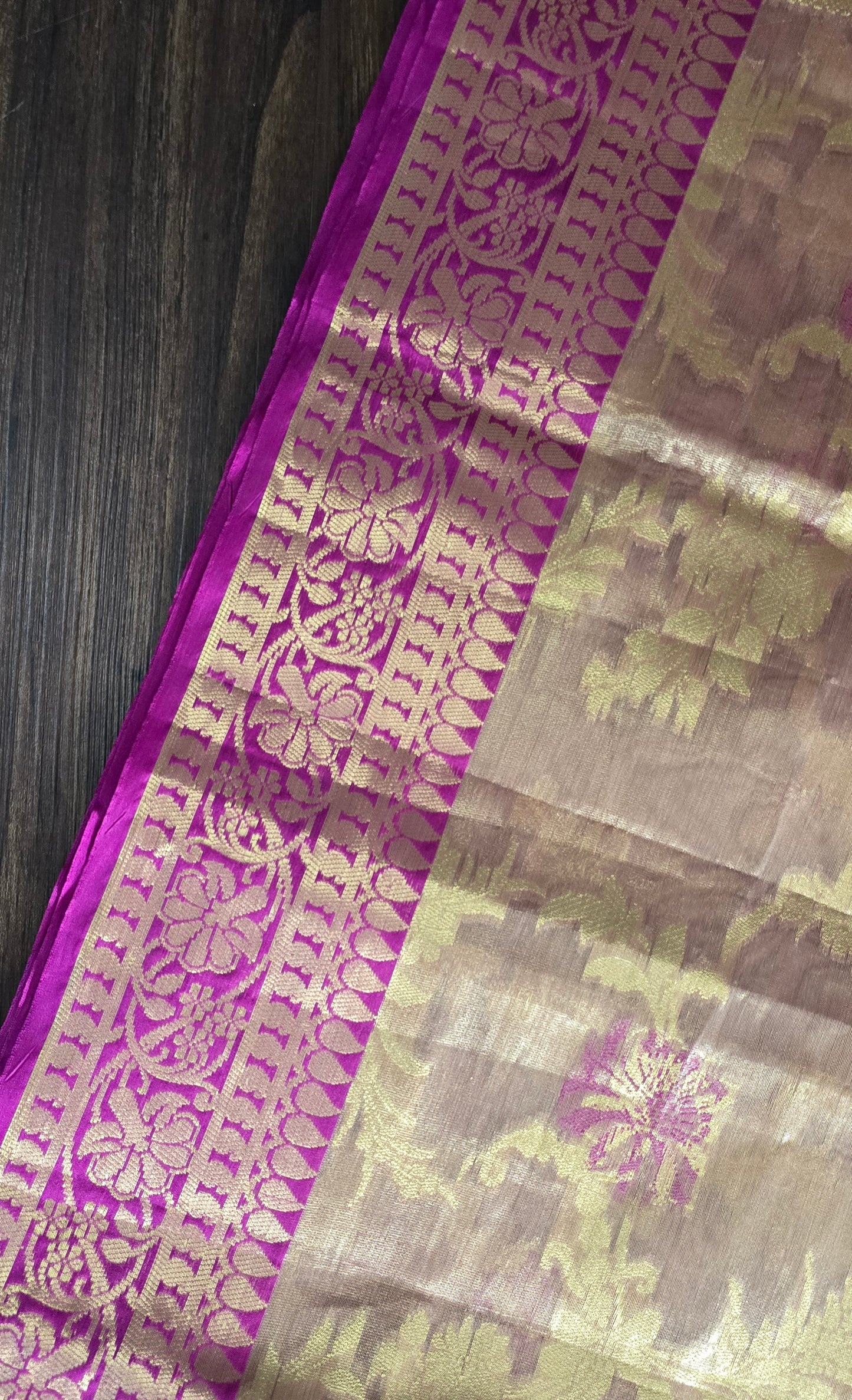 Semi soft Tissue Silk Saree with zari weave floral buta all over with contrast kanchi broad border.