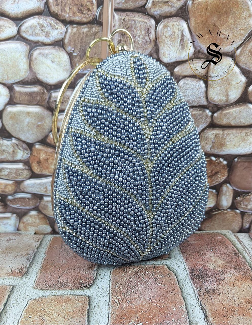 Coconut shape Denim blue beads leaf pattern party Clutch .