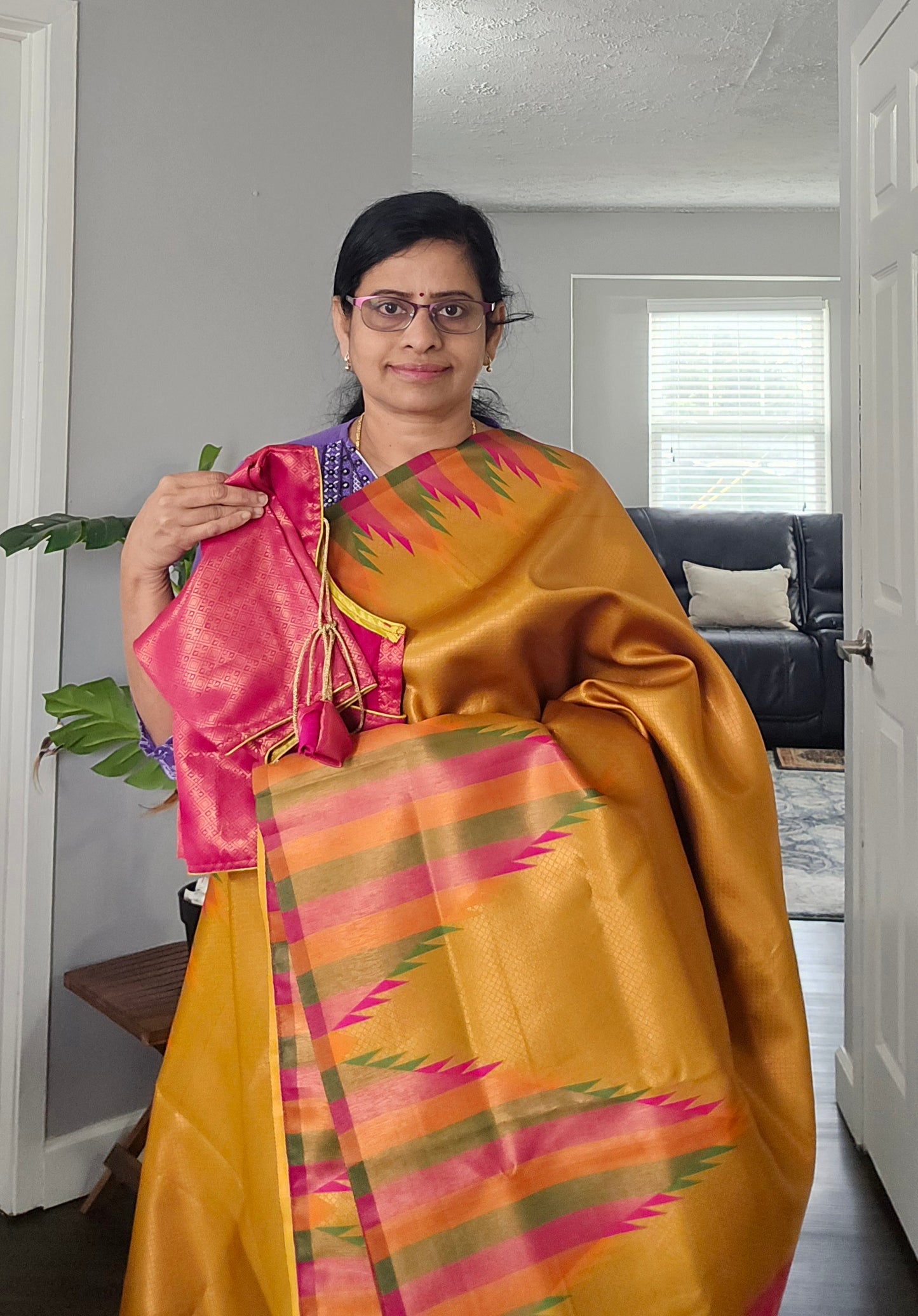 Golden yellow temple border semi silk saree with majenta Jacquard stitched blouse. Code - SAR101