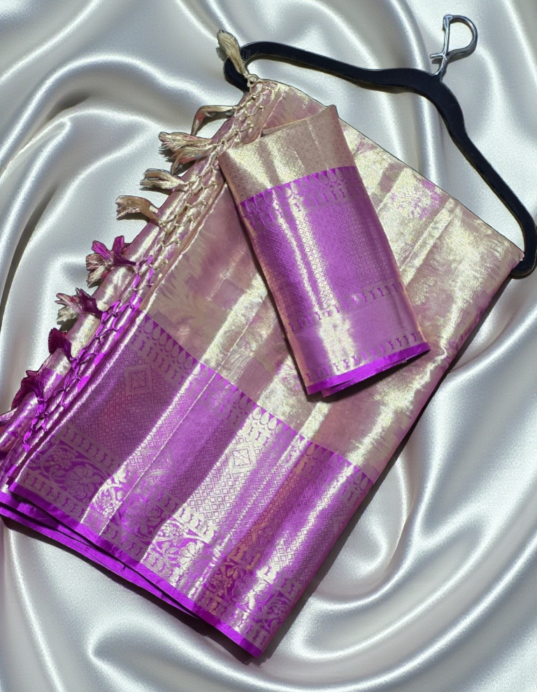 Semi soft Tissue Silk Saree with zari weave floral buta all over with contrast kanchi broad border.