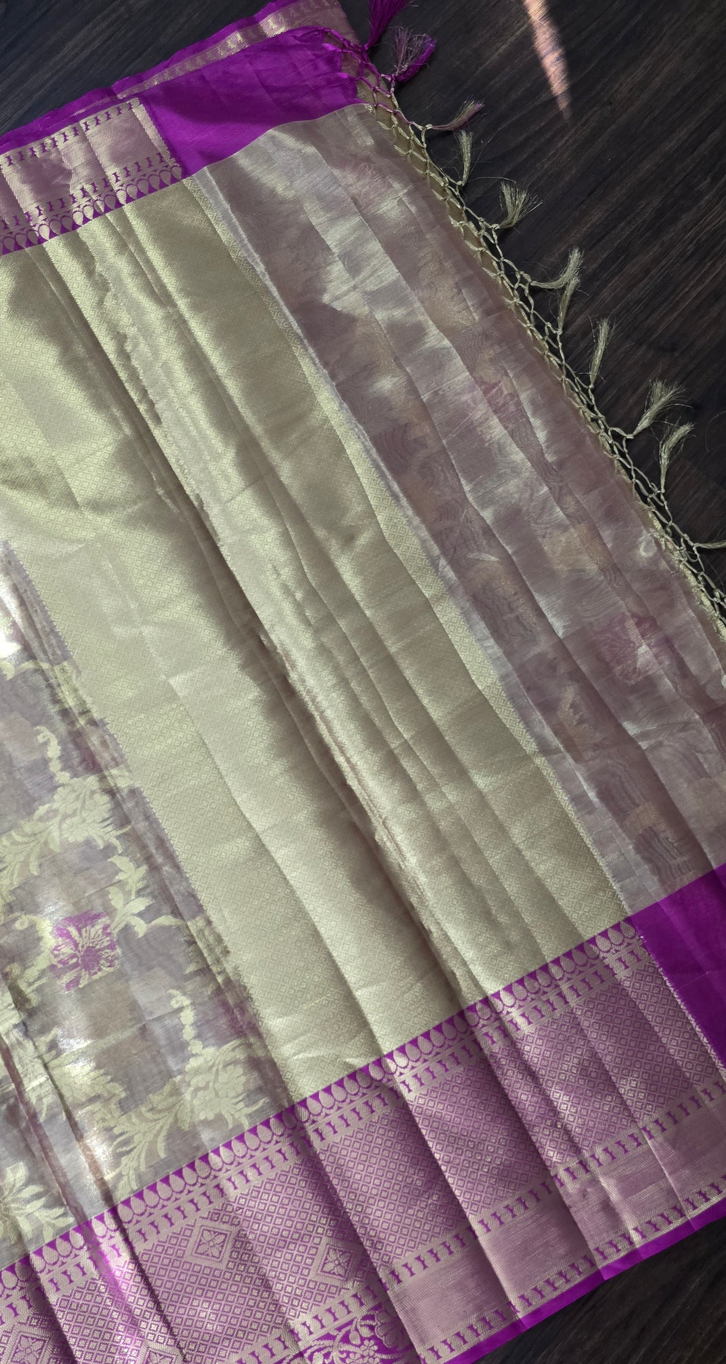 Semi soft Tissue Silk Saree with zari weave floral buta all over with contrast kanchi broad border.