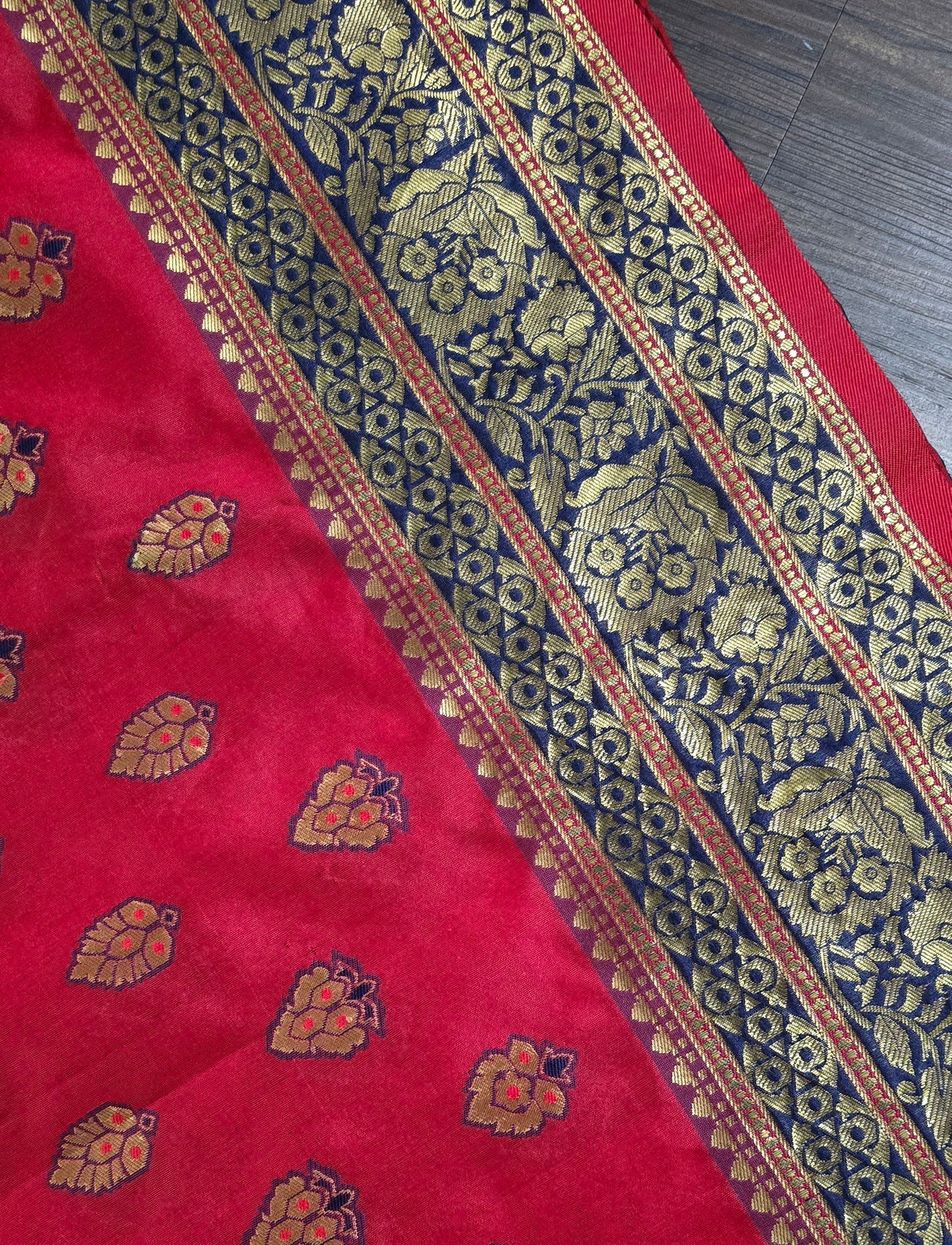 Art Silk soft saree in zari weave border and butas with stitched Blouse.