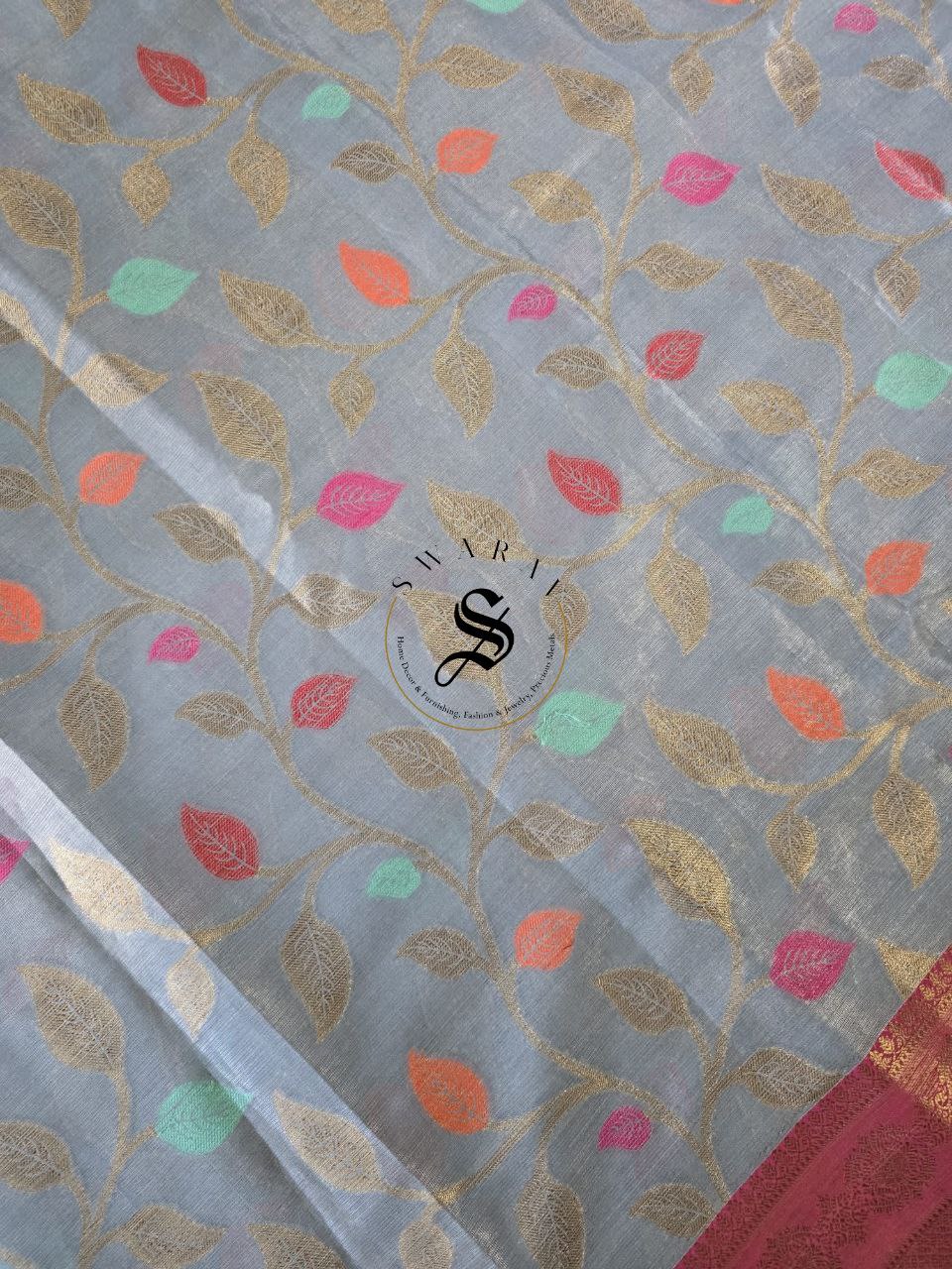 Tissue Silk saree with Zari weave leaf pattern with contrast Brocade blouse piece.