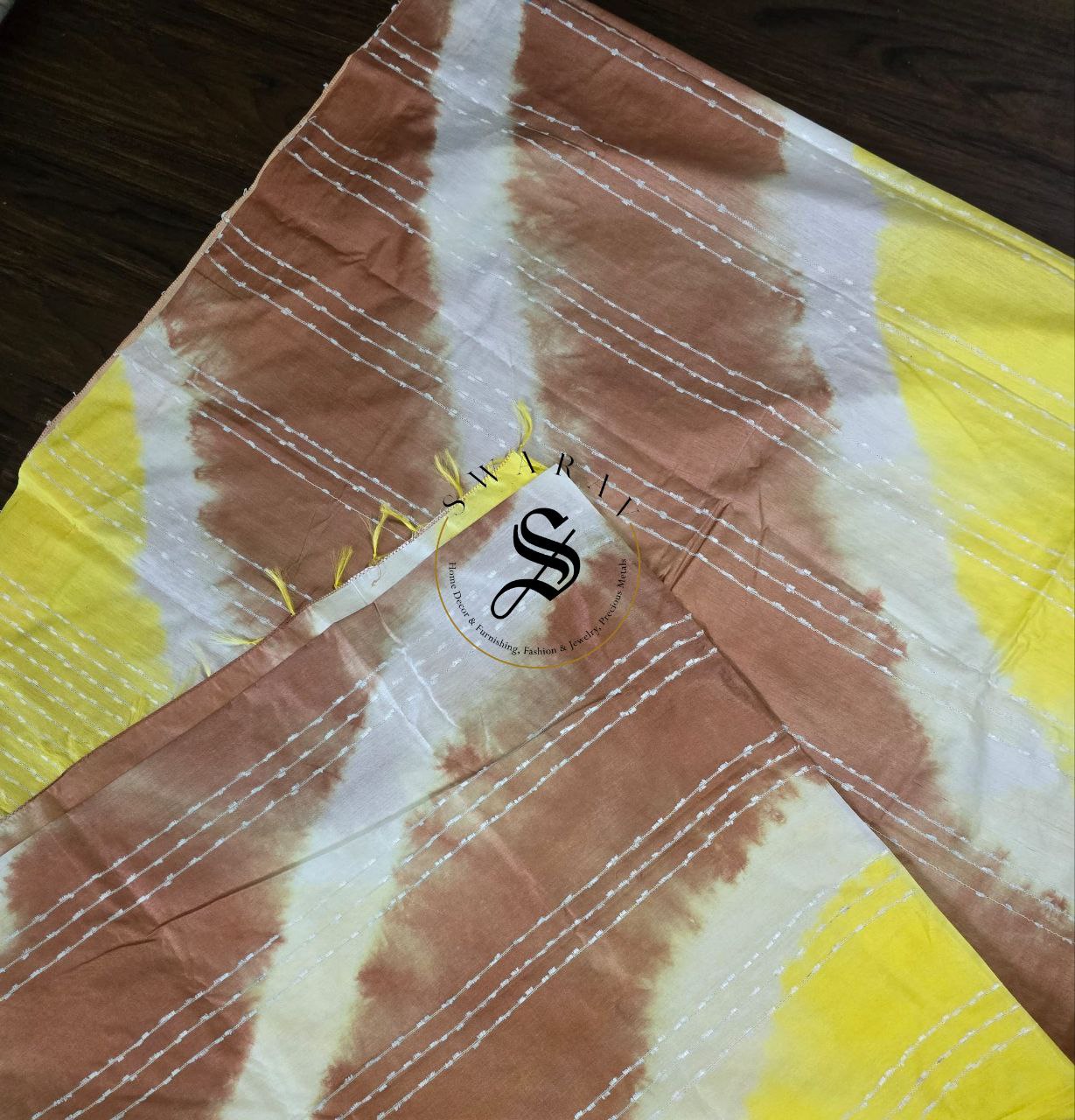 Semi Tussar hand shibori saree with stitched blouse. Color - yellow and brown