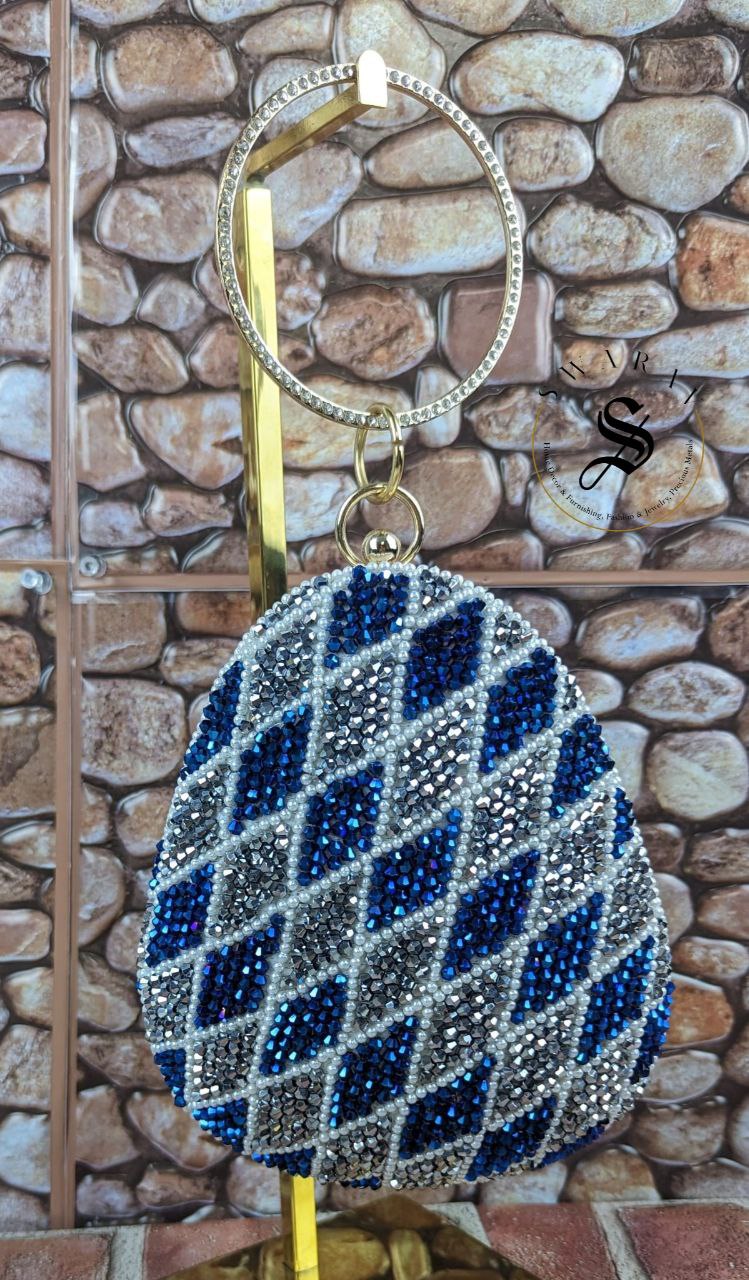 Coconut shape party clutch with Peacock Blue and Silver crystal Beads.