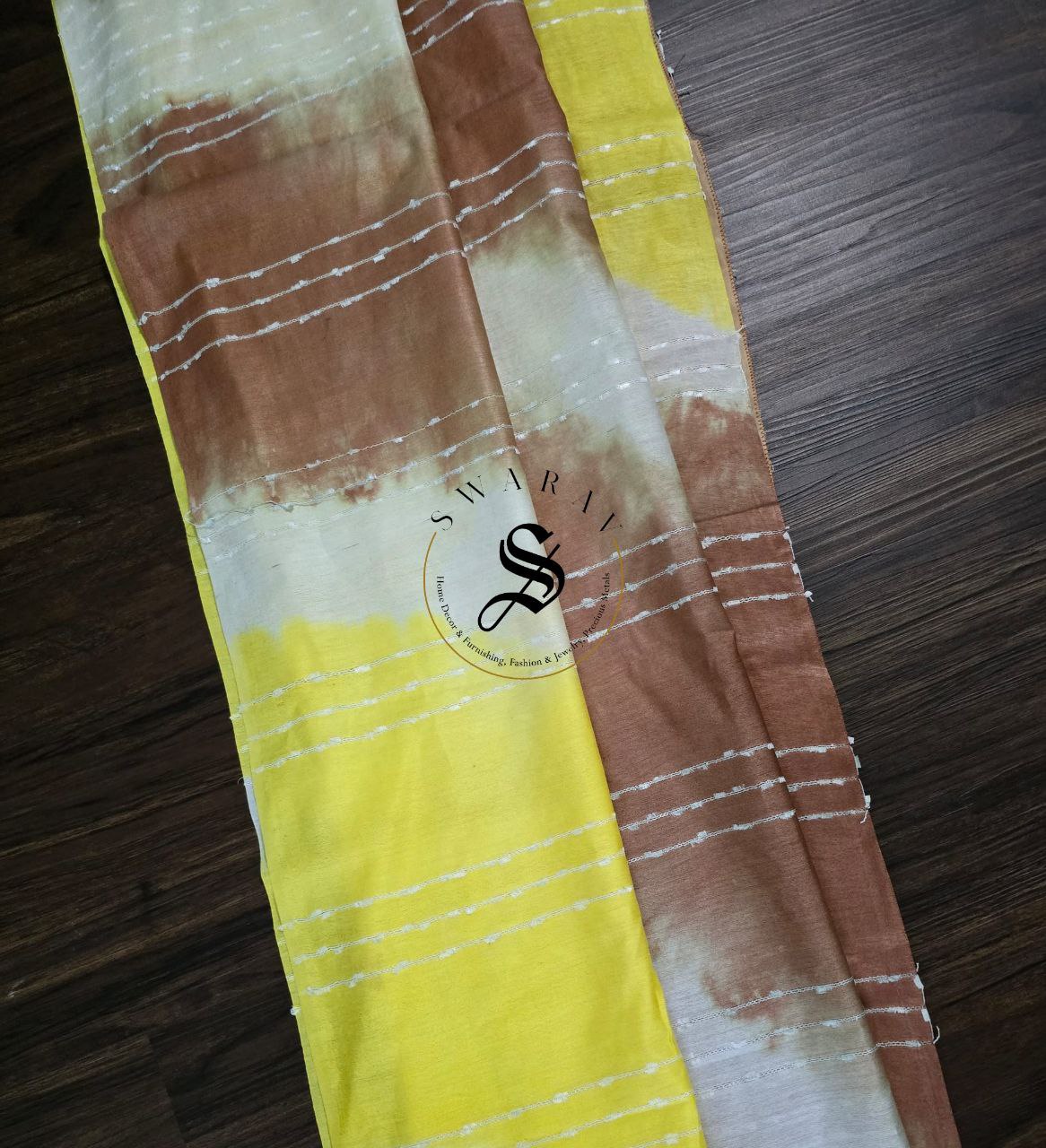 Semi Tussar hand shibori saree with stitched blouse. Color - yellow and brown