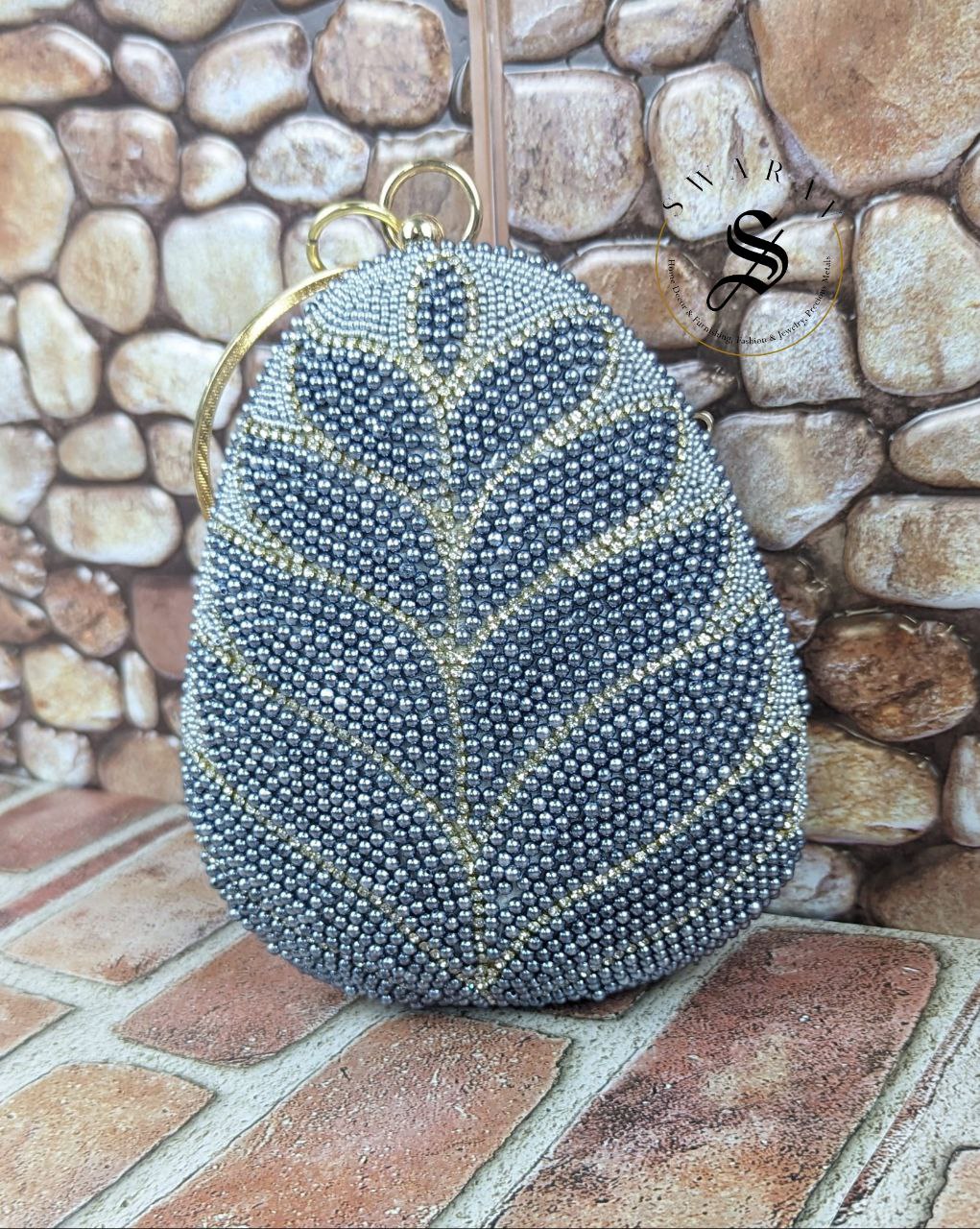 Coconut shape Denim blue beads leaf pattern party Clutch .