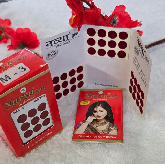 Box of 12 cards- 36 plain bindi on each card. Color - Maroon. @$0.66 each.
