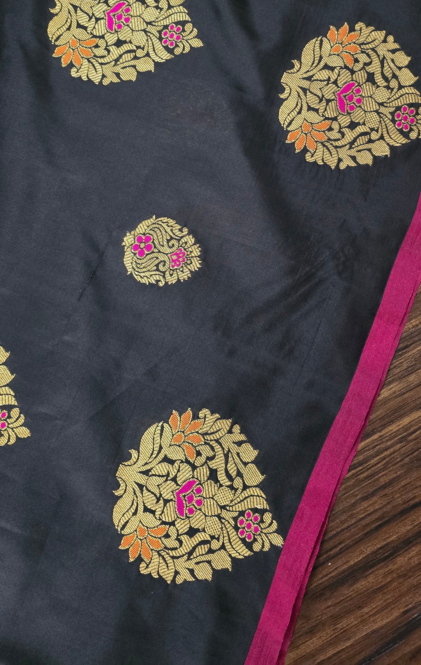 Black Art Silk soft saree in zari weave border and butas with stitched Blouse.
