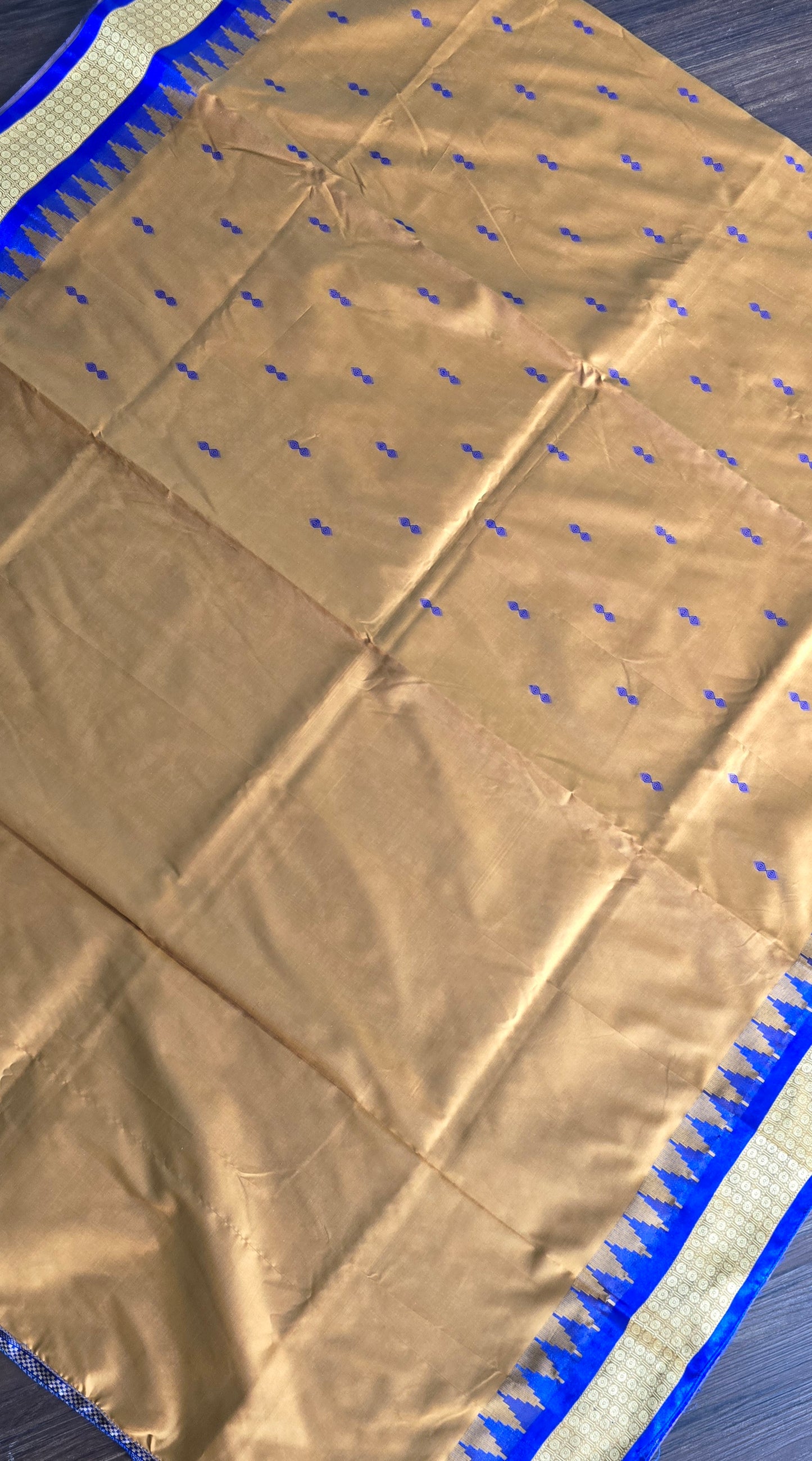 Mustard/turmeric yellow Sambalpuri Bomkai silk saree with royal blue stitched blouse. Code - SAR103