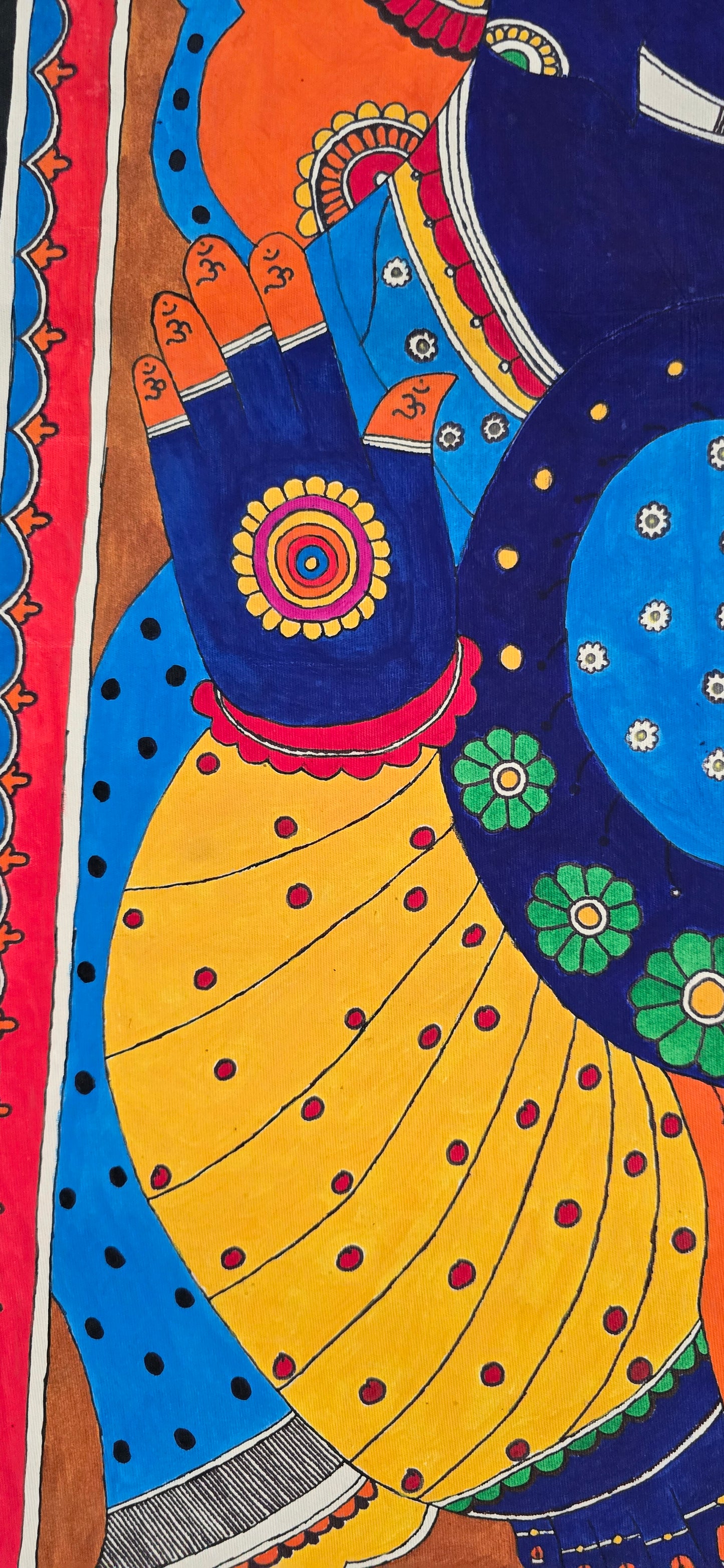 Madhubani or Mithila Painting – Lord Ganesha with his beautiful ornaments and Laddu in hand.