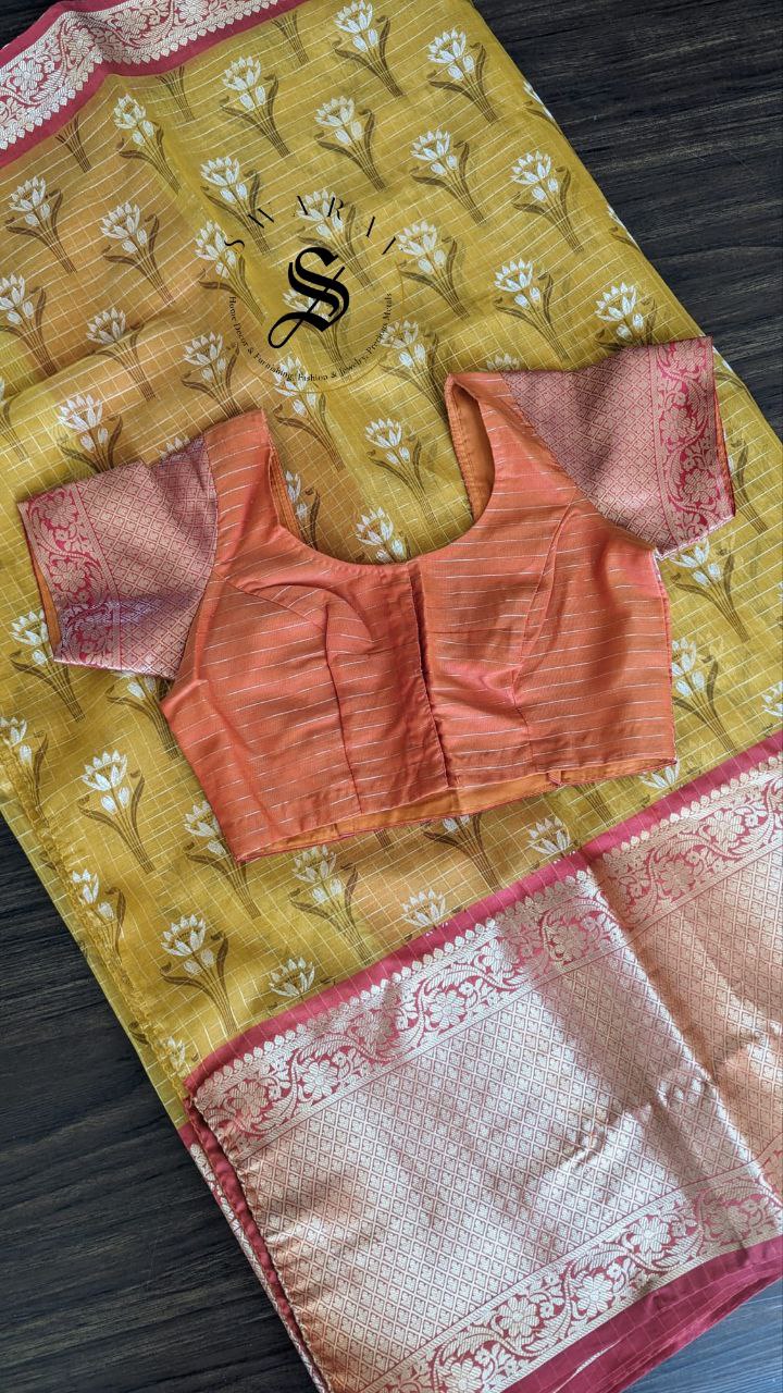 Organza floral silk saree with zari weave kanchi style skirt border and stitched blouse.