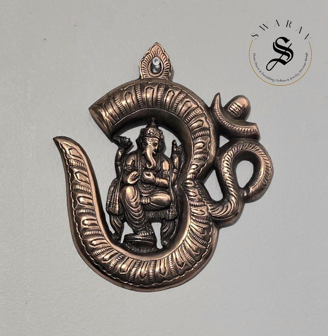 Gun metal ( Black metal/ Red Brass) Om Ganesha wall décor. Size - 9 inch.